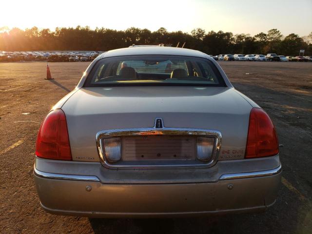 Photo 6 from auction – 2004 LINCOLN TOWN CAR E with VIN 1LNHM81W24Y607464
