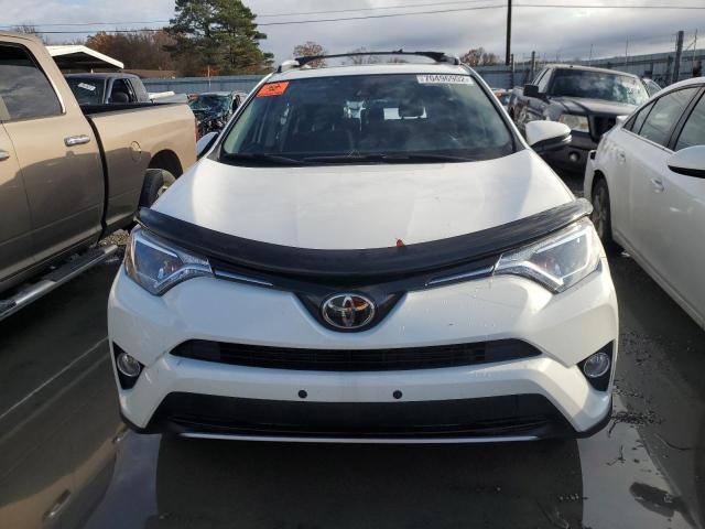 Photo 5 from auction – 2017 TOYOTA RAV4 XLE with VIN JTMRFREV4HJ116726