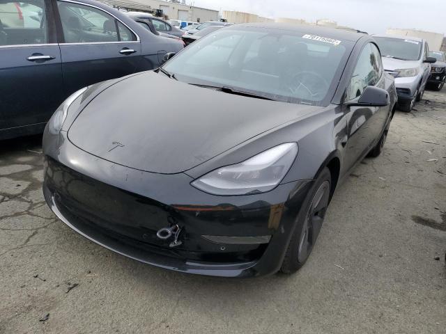 TESLA MODEL 3 2021 with VIN 5YJ3E1EA2MF877831 - Photo from auction