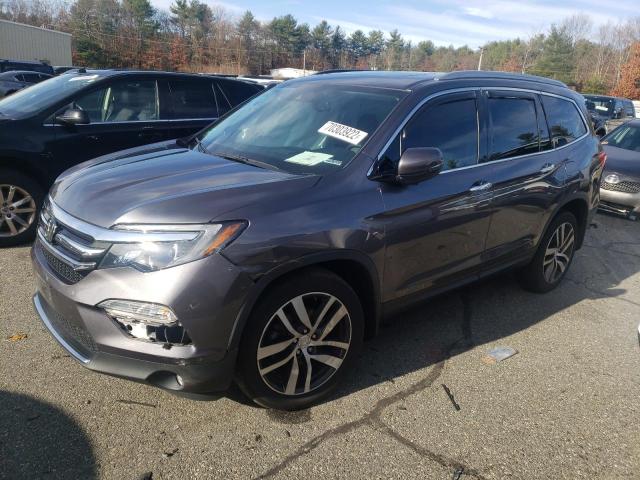 HONDA PILOT TOUR 2018 with VIN 5FNYF6H90JB026205 - Photo from auction