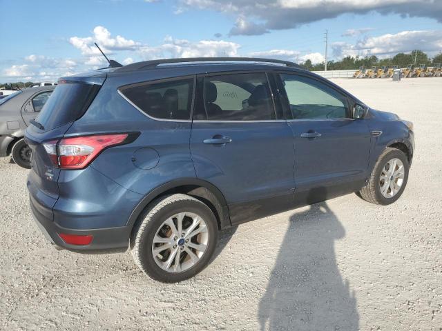 Photo 3 from auction – 2018 FORD ESCAPE SE with VIN 1FMCU0GD0JUB36628