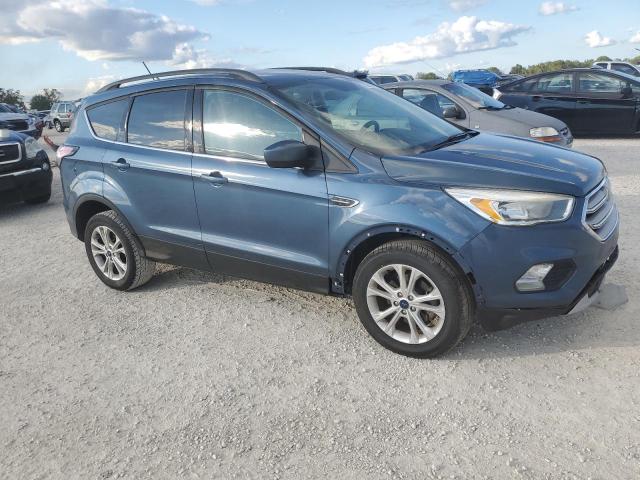 Photo 4 from auction – 2018 FORD ESCAPE SE with VIN 1FMCU0GD0JUB36628