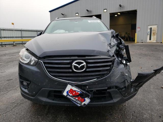 Photo 5 from auction – 2016 MAZDA CX-5 TOURI with VIN JM3KE2CY2G0661344