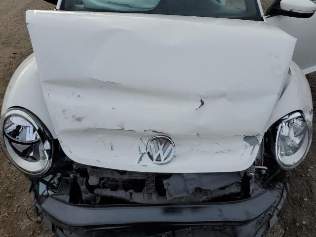 Photo 11 from auction – 2013 VOLKSWAGEN BEETLE with VIN 3VW5P7AT6DM828556