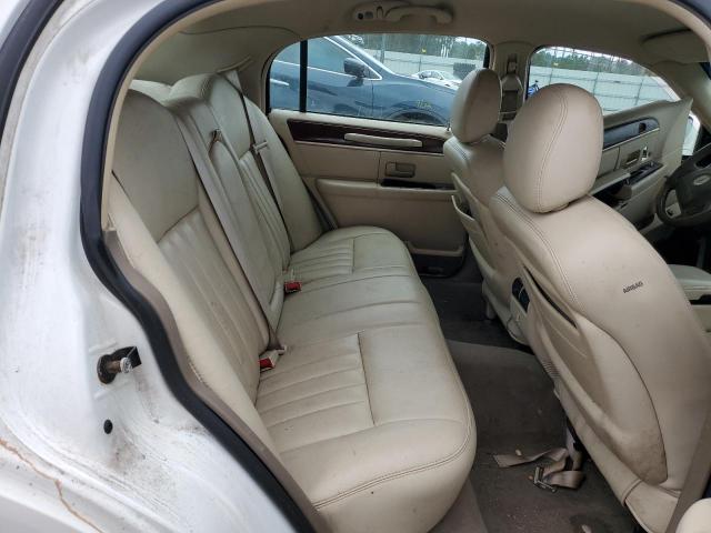 Photo 10 from auction – 2004 LINCOLN TOWN CAR E with VIN 1LNHM81WX4Y675351