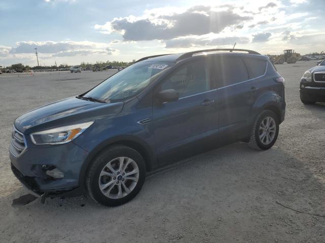 FORD ESCAPE SE 2018 with VIN 1FMCU0GD0JUB36628 - Photo from auction