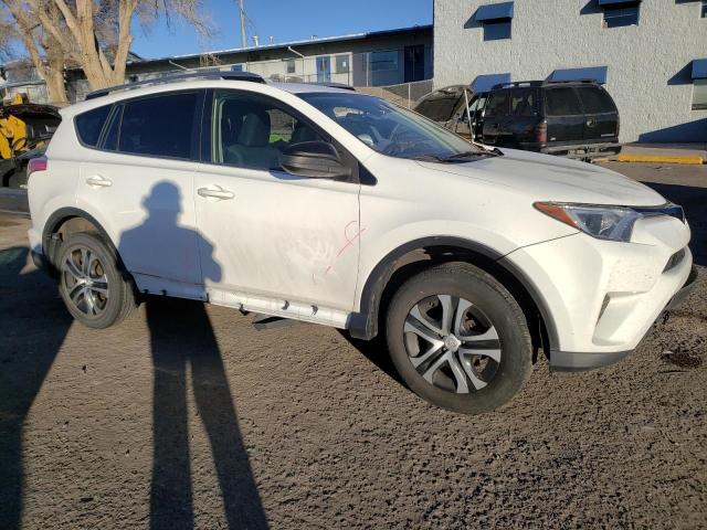 Photo 4 from auction – 2018 TOYOTA RAV4 LE with VIN JTMZFREV3JJ733086