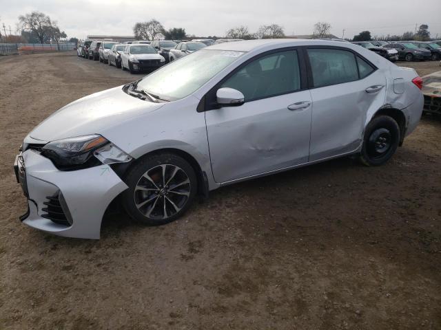 TOYOTA COROLLA L 2018 with VIN 2T1BURHE8JC023874 - Photo from auction