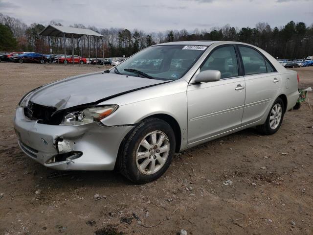 TOYOTA CAMRY LE 2003 with VIN 4T1BE30K93U690207 - Photo from auction