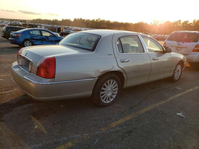 Photo 3 from auction – 2004 LINCOLN TOWN CAR E with VIN 1LNHM81W24Y607464