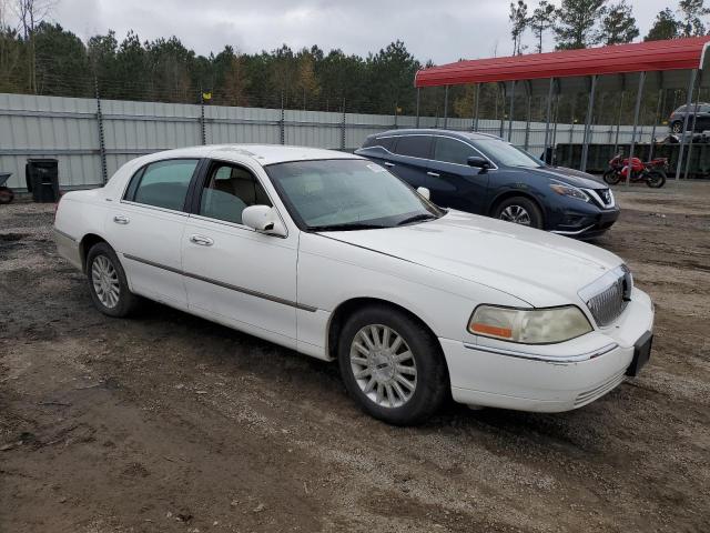 Photo 4 from auction – 2004 LINCOLN TOWN CAR E with VIN 1LNHM81WX4Y675351
