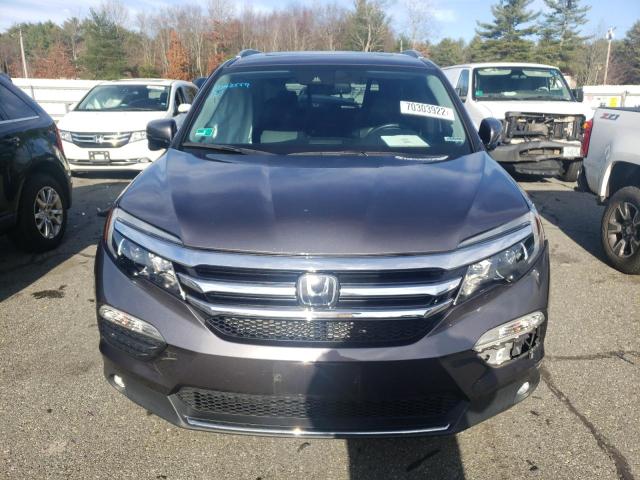 Photo 5 from auction – 2018 HONDA PILOT TOUR with VIN 5FNYF6H90JB026205