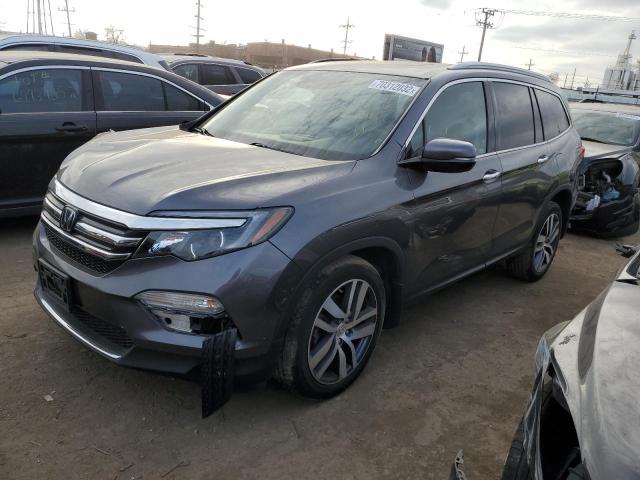 Photo 1 from auction – 2018 HONDA PILOT ELIT with VIN 5FNYF6H04JB030811