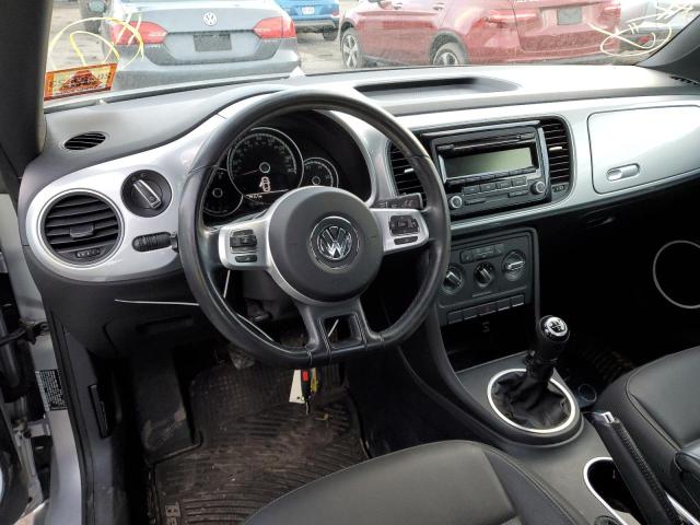 Photo 8 from auction – 2014 VOLKSWAGEN BEETLE with VIN 3VWHP7AT1EM609230