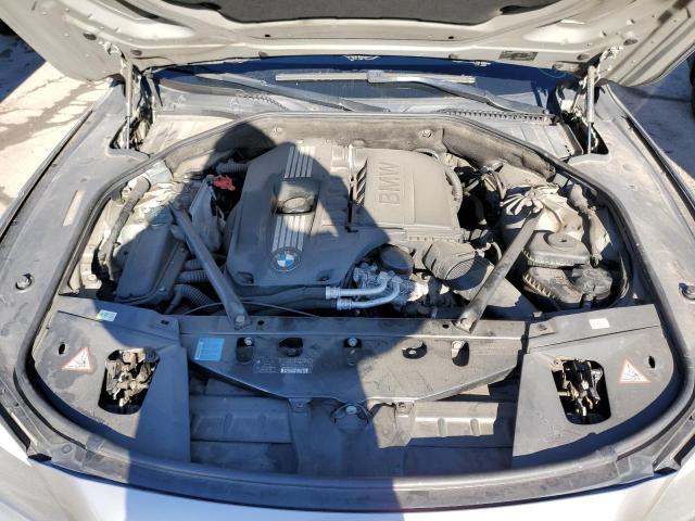 Photo 11 from auction – 2011 BMW 740 I with VIN WBAKA4C50BC612511