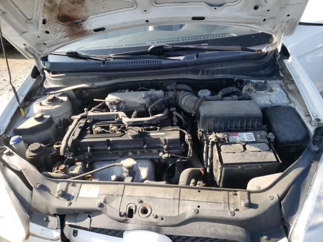 Photo 11 from auction – 2010 HYUNDAI ACCENT BLU with VIN KMHCM3AC0AU182218