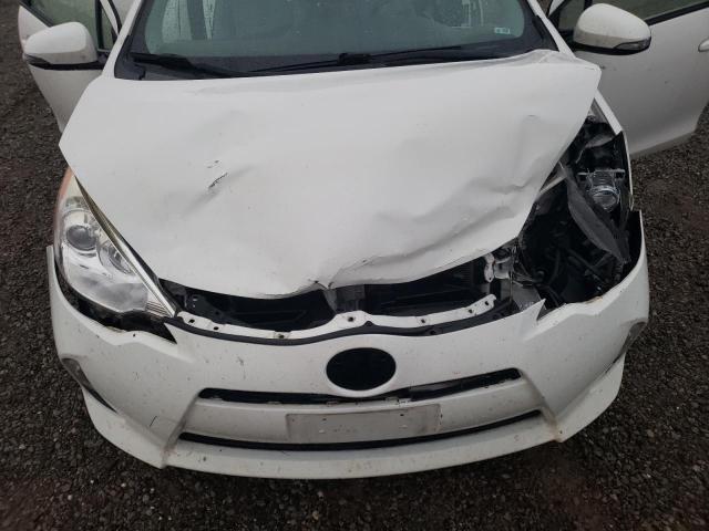 Photo 11 from auction – 2014 TOYOTA PRIUS C with VIN JTDKDTB39E1067929