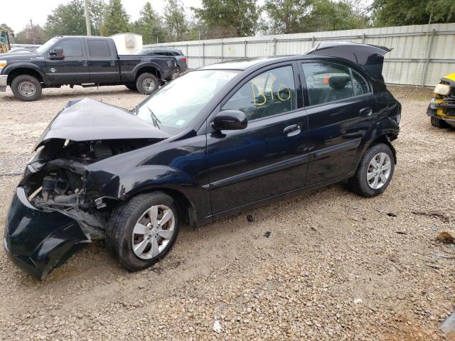 KIA RIO LX 2010 con VIN KNADH4A35A6614872 - Foto de la subasta