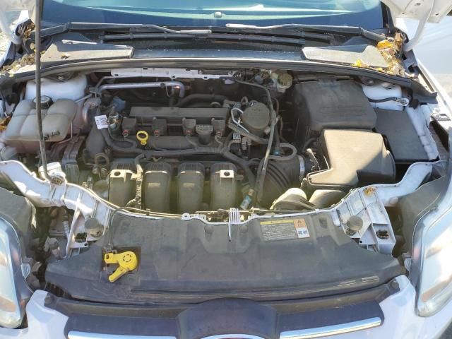 Photo 11 from auction – 2014 FORD FOCUS SE with VIN 1FADP3K29EL190955
