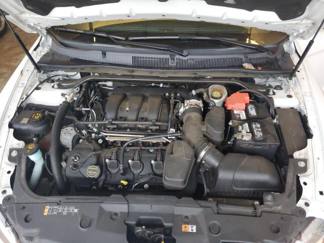 Photo 11 from auction – 2015 FORD TAURUS SEL with VIN 1FAHP2E86FG168238