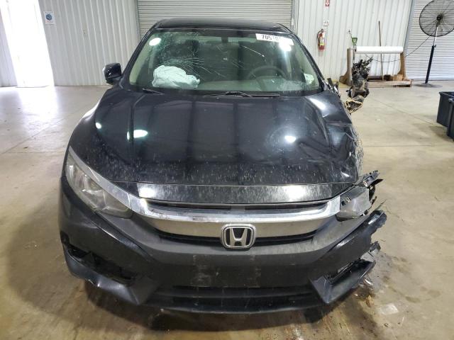 Photo 5 from auction – 2018 HONDA CIVIC LX with VIN 19XFC2F5XJE033998