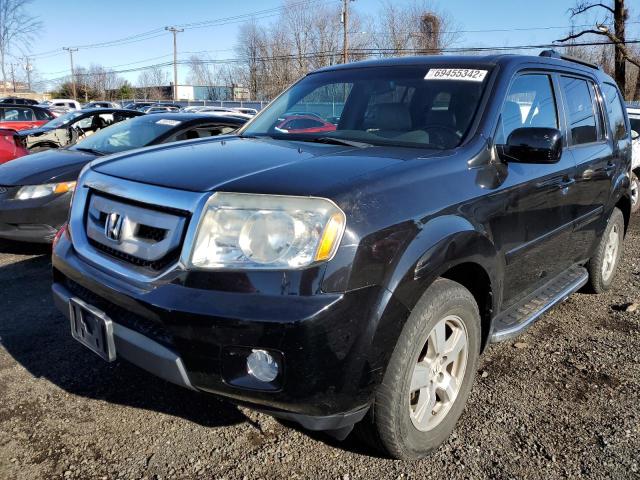 HONDA PILOT EXL 2011 with VIN 5FNYF4H69BB096359 - Photo from auction