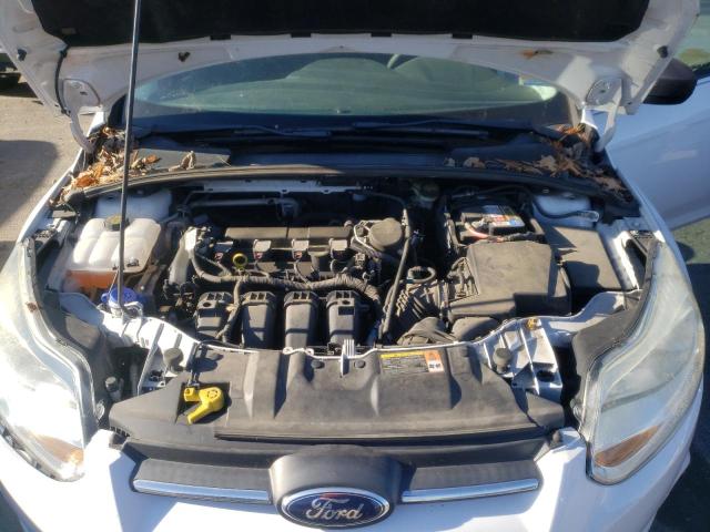 Photo 11 from auction – 2014 FORD FOCUS S with VIN 1FADP3E21EL259066