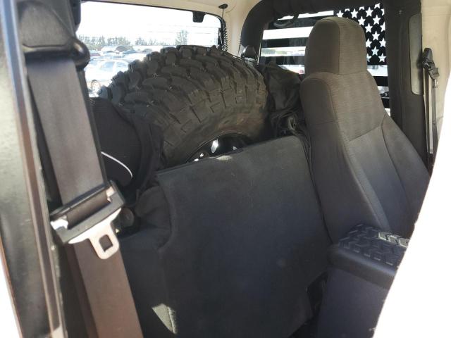 Photo 10 from auction – 2004 JEEP WRANGLER X with VIN 1J4FA39S14P745389