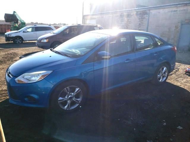 FORD FOCUS SE 2014 with VIN 1FADP3F21EL240984 - Photo from auction
