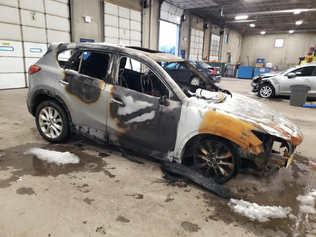 Photo 4 from auction – 2014 MAZDA CX-5 GT with VIN JM3KE4DY1E0302221