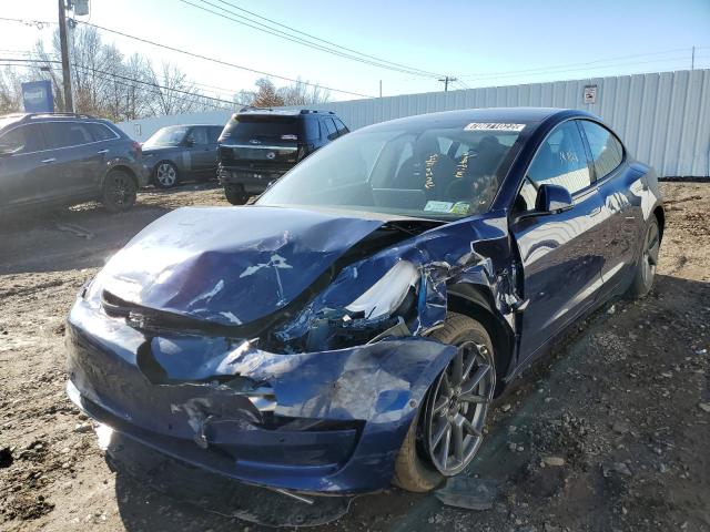 TESLA MODEL 3 2022 with VIN 5YJ3E1EAXNF372539 - Photo from auction
