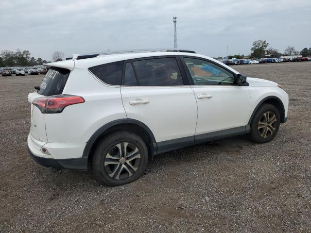 Photo 3 from auction – 2018 TOYOTA RAV4 LE with VIN JTMZFREV3JJ196171