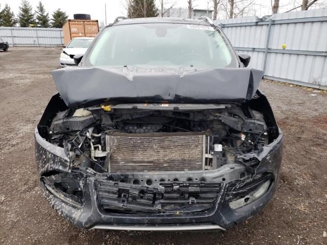 Photo 5 from auction – 2014 FORD ESCAPE TIT with VIN 1FMCU9J98EUD74354