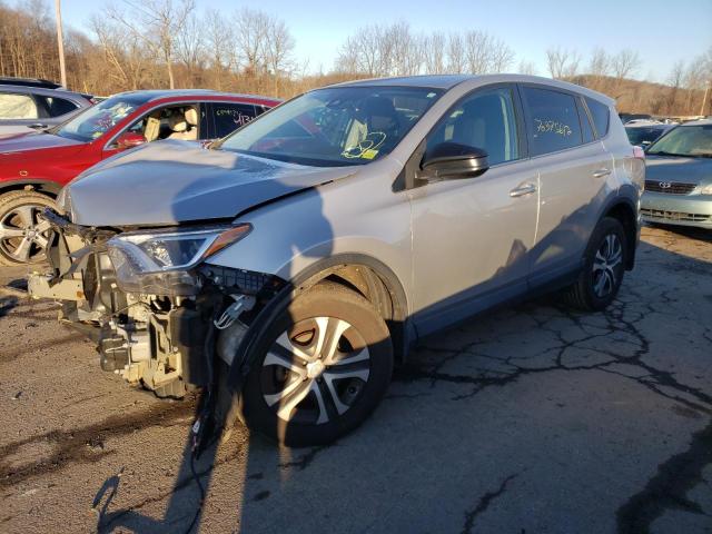 TOYOTA RAV4 LE 2018 with VIN 2T3BFREV5JW710668 - Photo from auction