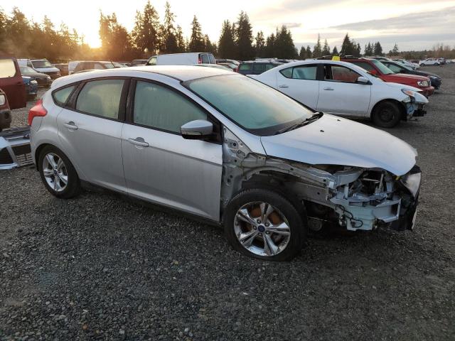 Foto 4 de la subasta – 2014 FORD FOCUS SE con VIN 1FADP3K23EL239695