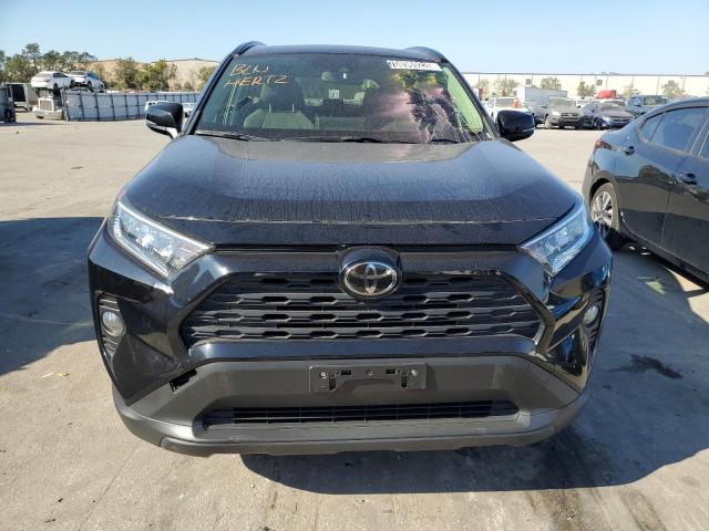 Photo 5 from auction – 2019 TOYOTA RAV4 XLE with VIN JTMP1RFV2KD011564