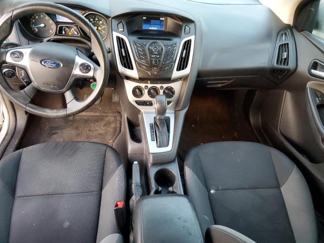 Foto 8 de la subasta – 2014 FORD FOCUS SE con VIN 1FADP3K23EL239695