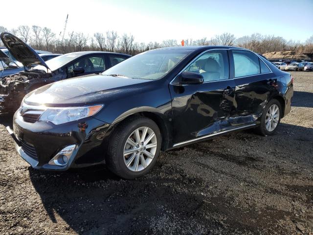 TOYOTA CAMRY L 2014 with VIN 4T4BF1FK1ER359560 - Photo from auction