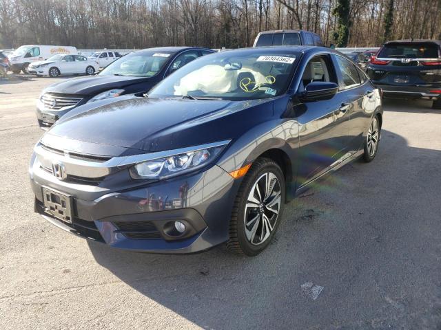 HONDA CIVIC EX 2018 with VIN 2HGFC1F34JH640669 - Photo from auction