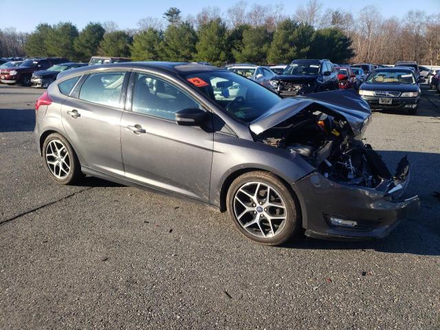 Foto 4 de la subasta – 2017 FORD FOCUS SEL con VIN 1FADP3M23HL321718