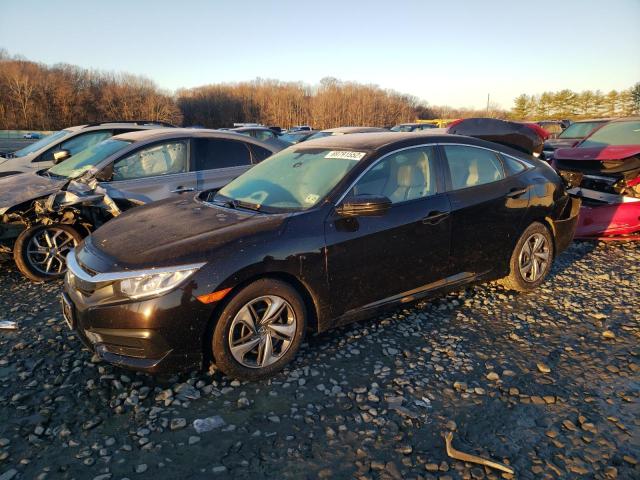 HONDA CIVIC LX 2018 with VIN 2HGFC2F52JH528895 - Photo from auction