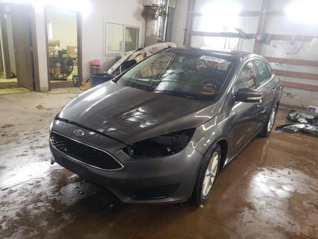 FORD FOCUS SE 2016 with VIN 1FADP3F25GL201804 - Photo from auction