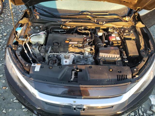 Photo 11 from auction – 2018 HONDA CIVIC LX with VIN 2HGFC2F52JH528895