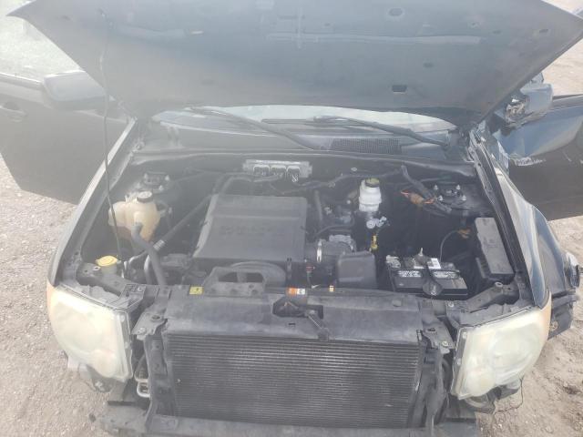 Photo 12 from auction – 2011 FORD ESCAPE LIM with VIN 1FMCU0EG3BKA61689