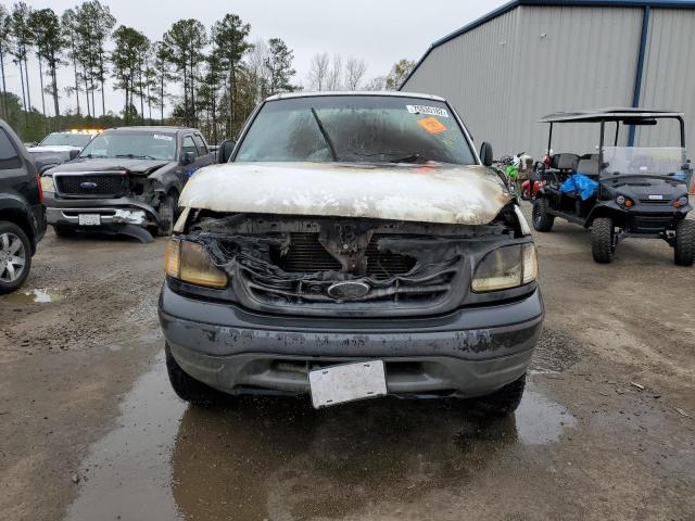 Photo 5 from auction – 2002 FORD F150 with VIN 1FTRF18W52NB49546