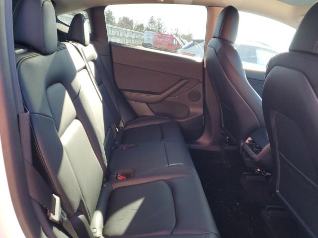 Photo 10 from auction – 2021 TESLA MODEL Y with VIN 5YJYGDEE9MF295620