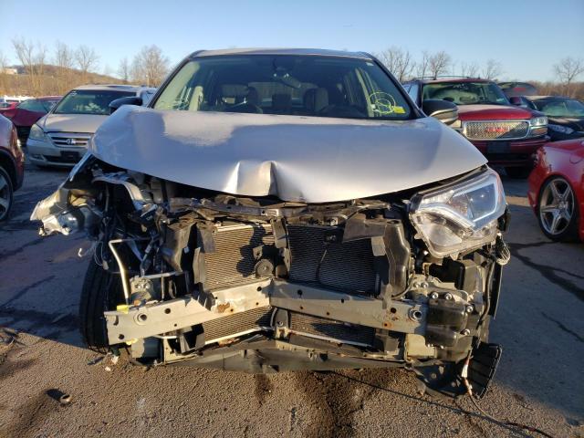 Photo 5 from auction – 2018 TOYOTA RAV4 LE with VIN 2T3BFREV5JW710668