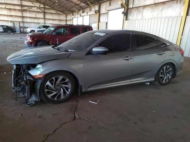 HONDA CIVIC EX 2017 with VIN 19XFC2F74HE002810 - Photo from auction
