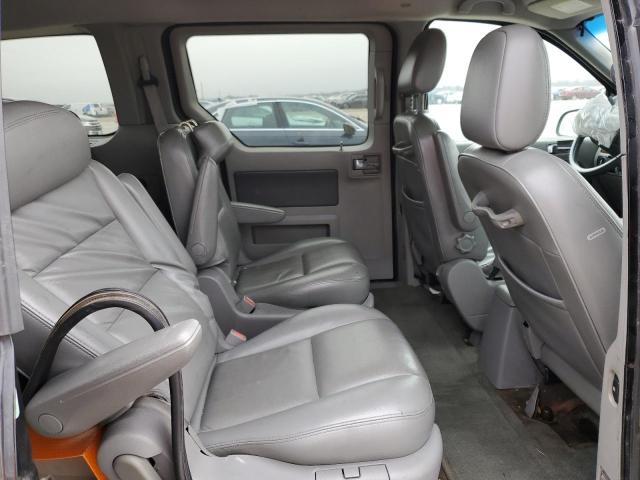 Photo 11 from auction – 2004 FORD FREESTAR L with VIN 2FMDA58224BB06466