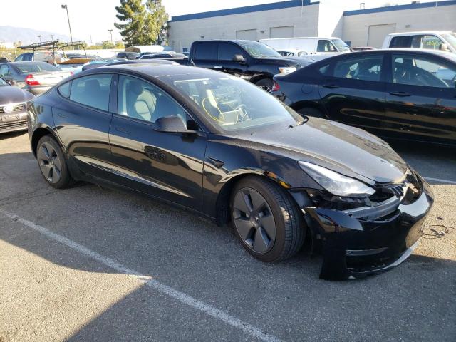 Photo 4 from auction – 2022 TESLA MODEL 3 with VIN 5YJ3E1EB2NF255580